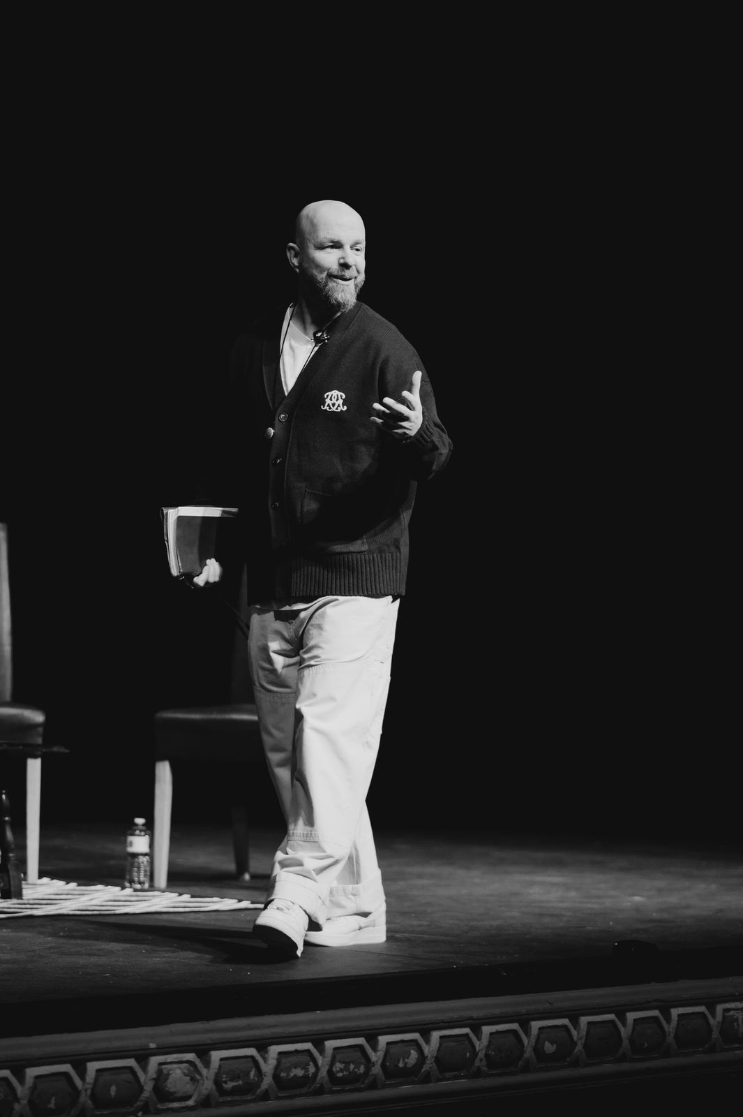 Luke Staton walking the stage at Theatre Royal Wakefield.