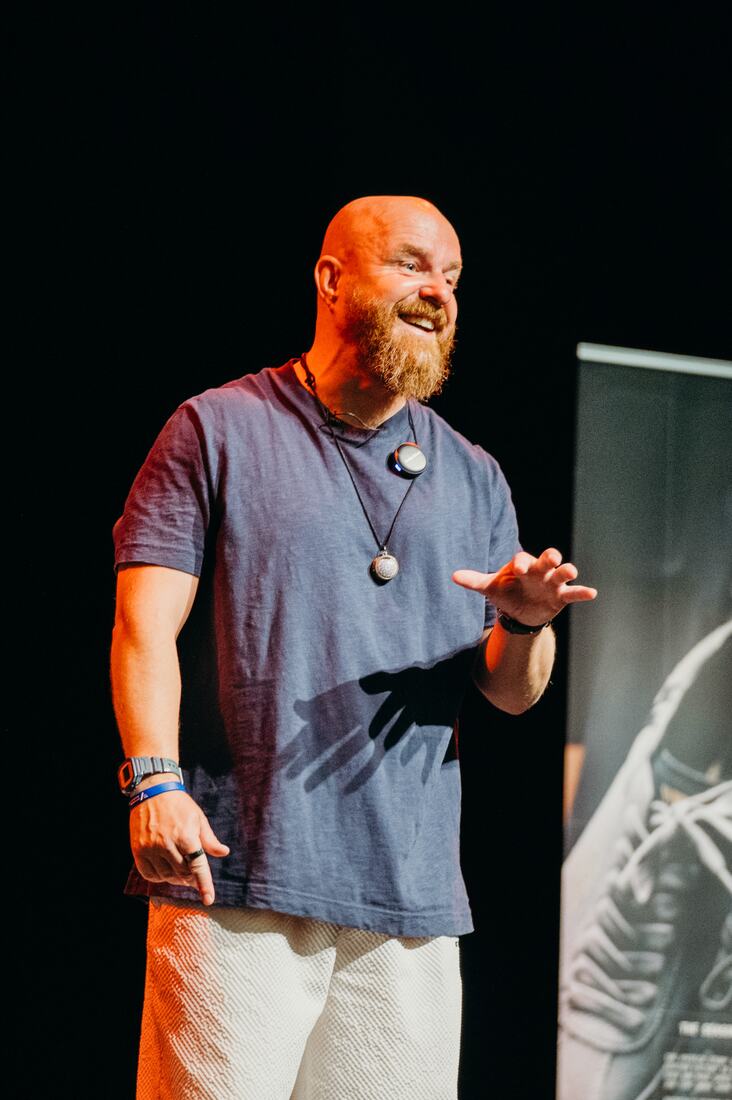 Luke Staton laughing on stage at Inspire Beyond 2026, Theatre Royal Wakefield.